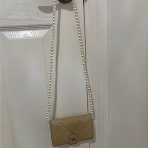 Authentic Chanel beige wallet.